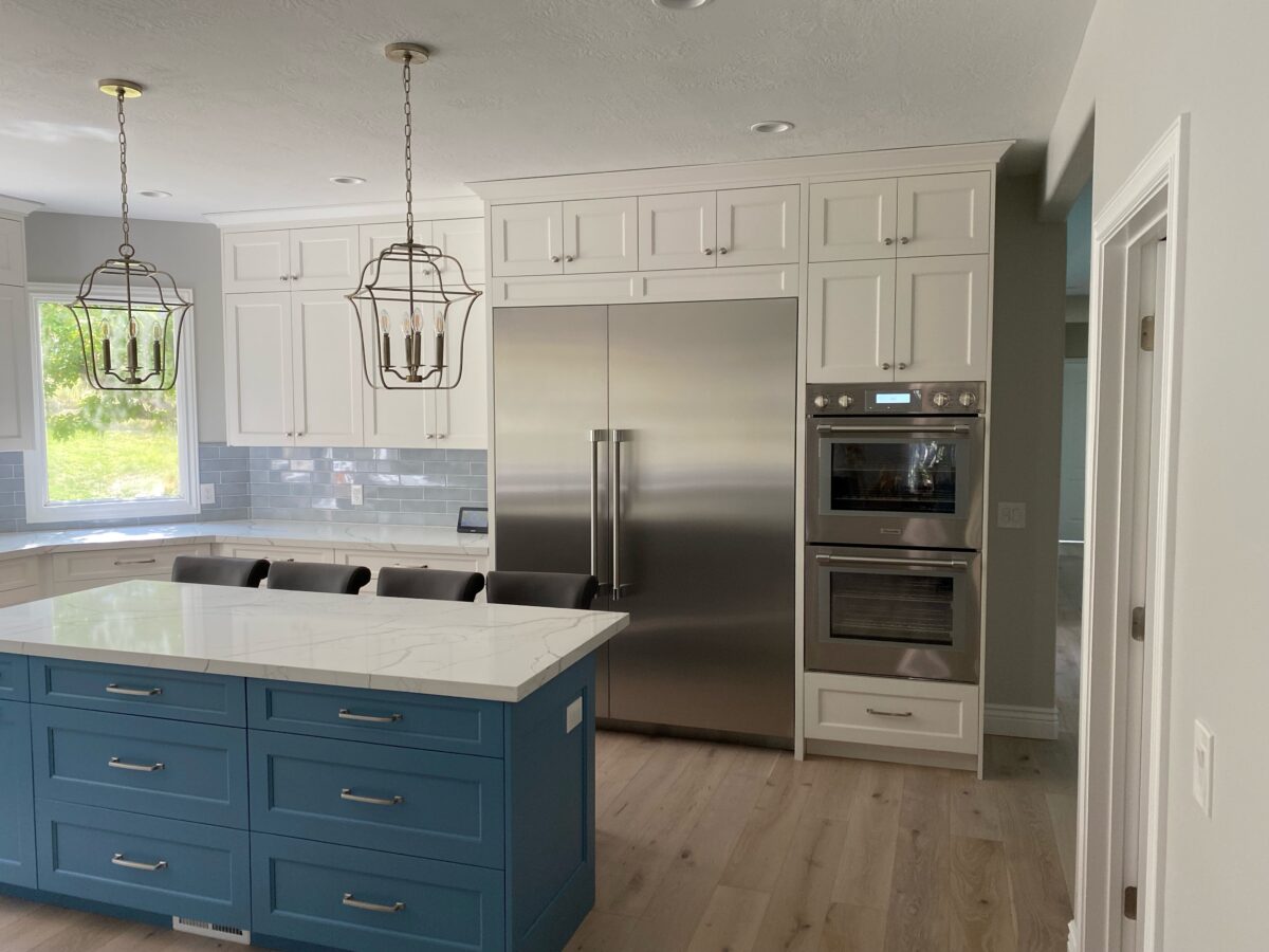 White Kitchen with Blue Island